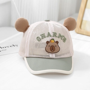 Close-up of breathable mesh material with cartoon capybara embroidery on toddler cap