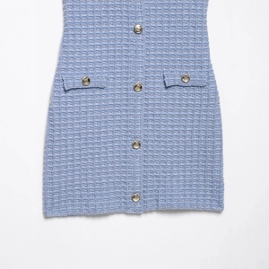 Elegant blue waffle knit halter dress with embossed metal buttons and pocket details