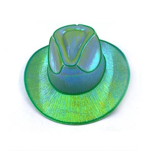 Macro shot of green iridescent holographic cowboy hat with shiny metallic finish texture