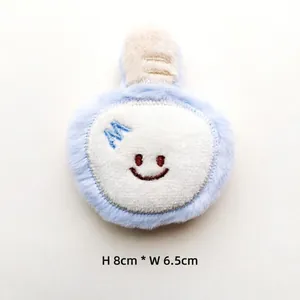 Close-up of cute 8x6.5cm plush badminton racket accessory with blue M embroidery