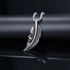 Punk skull and feather pendant necklace in vintage silver finish with bead chain