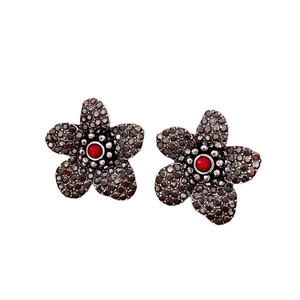 Vintage floral stud earrings with black crystals and red bead center in gothic style