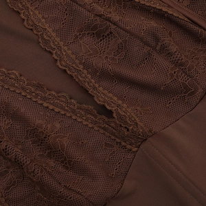 Detailed close-up of brown lace embroidery and smooth fabric on the slim long sleeve top