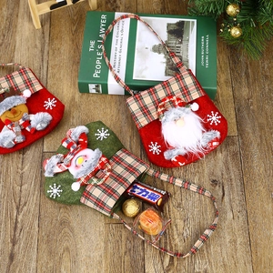 Cartoon Christmas non-woven gift bags featuring Santa, Snowman and Reindeer characters