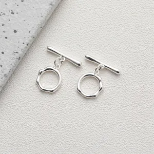 Detailed view of silver 14K plated irregular wave texture OT clasp for DIY jewelry