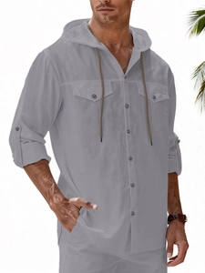 Detail of grey men's linen hooded shirt with front flap pockets and drawstring hood texture