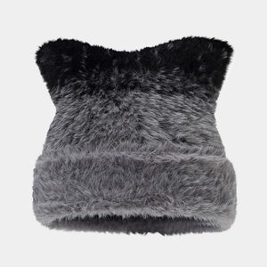 Close-up of black and grey gradient faux fur beanie with cute cat ear design and plush texture