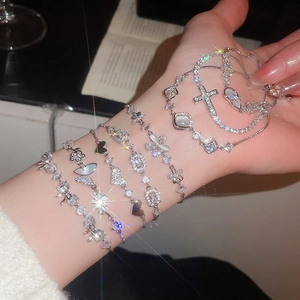 Gold plated cat-eye stone bow pendant bracelet set with zircon butterfly and flower designs
