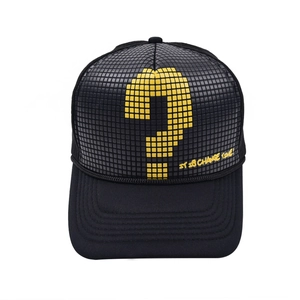 Close-up of black mesh baseball cap with yellow question mark and artistic slogan