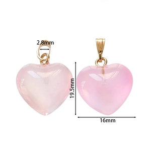Detailed dimensions of a translucent pink acrylic heart pendant with measurement labels