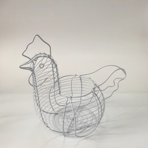 Detail of white rooster-shaped wire egg basket made of durable powder-coated metal