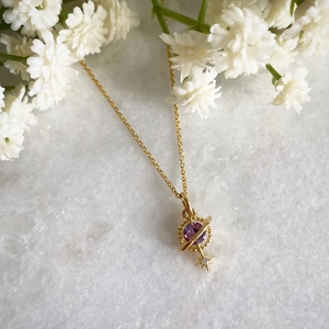 Vintage 18K gold plated Saturn pendant necklace with purple gemstone and star charm