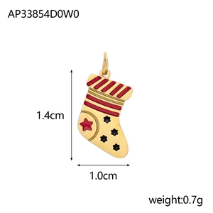 Detailed view of a gold Christmas sock pendant with red enamel and size measurements