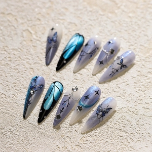 Blue-purple gradient butterfly press-on nails with cat-eye glitter and rhinestones