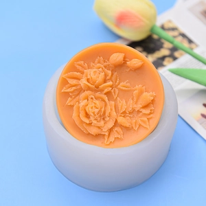 DIY circular silicone mold featuring a detailed 3D rose pattern for soap and candle making