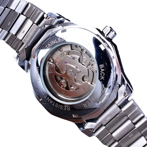 Skeleton automatic mechanical watch showing stainless steel case back and clear movement