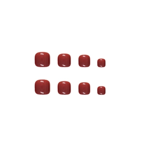 Polished burgundy press-on toe nails in various sizes shown on a white background
