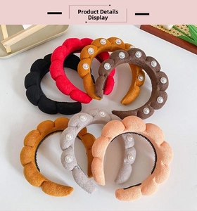 Detail view of multi-colored padded headbands with pearls and non-slip inner teeth