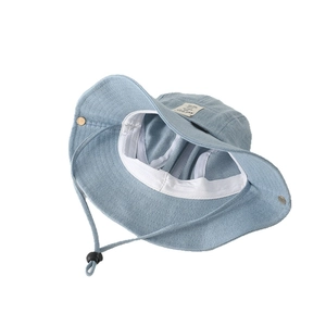 Blue denim kids bucket hat with sun protection brim and adjustable drawstring cord