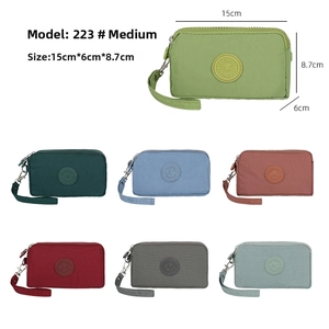 Size guide for multi-compartment nylon phone purses in seven vibrant colors
