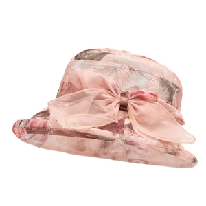 Women's organza bucket hat with floral print and large decorative pink bow for sun protection