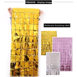 Detail of silver square foil fringe curtain with metallic reflection for party background