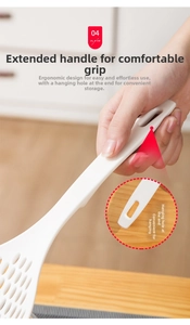 Macro detail of ergonomic long handle with hanging hole on heat resistant slotted spoon
