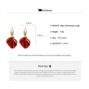 Detail showing dimensions 1.5x4.5cm and red frosted acrylic flower petal earrings