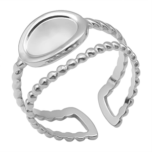Macro view of double-layered stainless steel ring featuring twist and bead textures