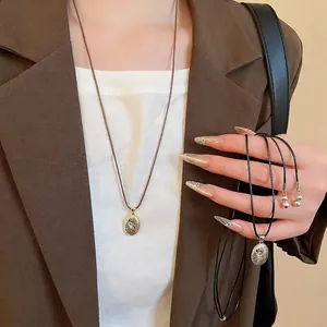 Retro Alloy Spiral Texture Oval Pendant Long Necklace With Brown Wax Rope Cord Fashion Sweater Chain For Women