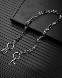 Detail view of punk skull link pants chain in vintage silver with lobster clasp and ring