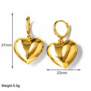 Detailed view of polished heart hoop earrings with 37mm height and 22mm width dimensions