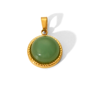 Detail of a vintage gold-plated pendant with an inset green natural stone and rope frame