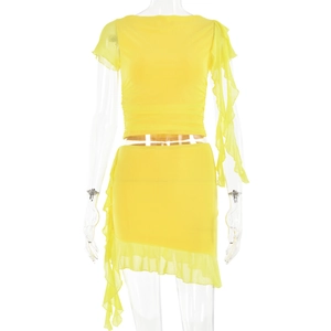 Detail of yellow two-piece set featuring ruffled short sleeves and asymmetrical mini skirt