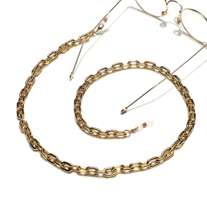Golden oval U-link acrylic eyeglass chain and mask strap shown on white background
