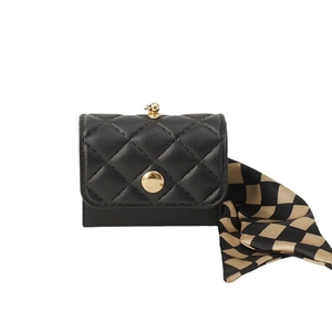 Mini black quilted coin purse with gold skull pendant and checkered scarf handle