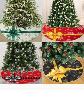 Detail showing four Christmas tree skirts with festive bow knots and snowflake patterns