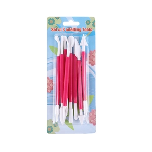 Detail of 8-piece pink double-ended fondant modeling tools in retail packaging