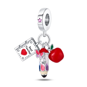 Detail of Best Teacher charm featuring a notebook, red apple, and colorful pencils