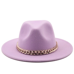 Close-up of lavender wool felt fedora with a decorative chunky gold chain accent