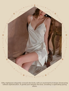 Detail of white silk satin sleepwear featuring side lace-up design and V-neckline