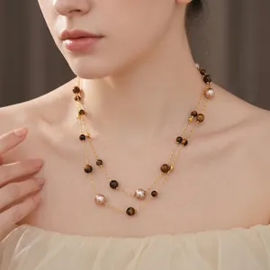 Vintage double layer tiger eye and pearl necklace with golden chains in retro style