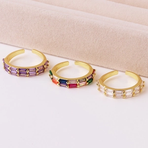 Close-up of three 18K gold plated adjustable rings with double-row rectangular zircon stones