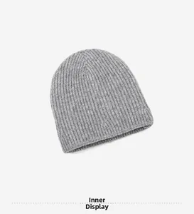 Interior view showing the ribbed knit texture of the gray wool beanie cap