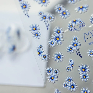 3D embossed blue daisy nail art stickers with relief texture on transparent backing