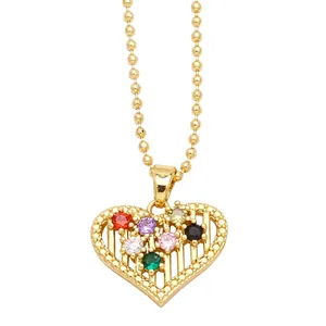 Golden heart pendant necklace with colorful cubic zirconia on a bead chain