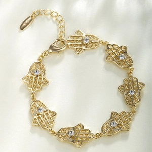 Bracelet main de Fatma dorée avec cristaux étincelants et fermoir réglable pour femme