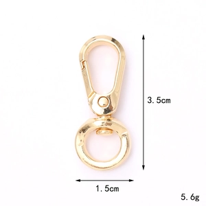 Detail of 3.5cm gold lobster clasp with 1.5cm rotating ring and dimensions label
