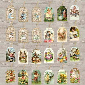 Vintage paper Easter gift tags with colorful illustrations hanging on a wooden background