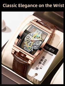 Close-up of rose gold barrel-shaped skeleton watch with brown leather strap in a gift box